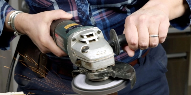 cutting concrete with a cutting fiberglass and concrete angle grinder wheel